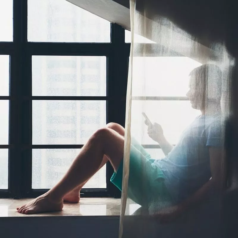 lonely-man-with-mobile-phone-2021-08-26-22-38-50-utc